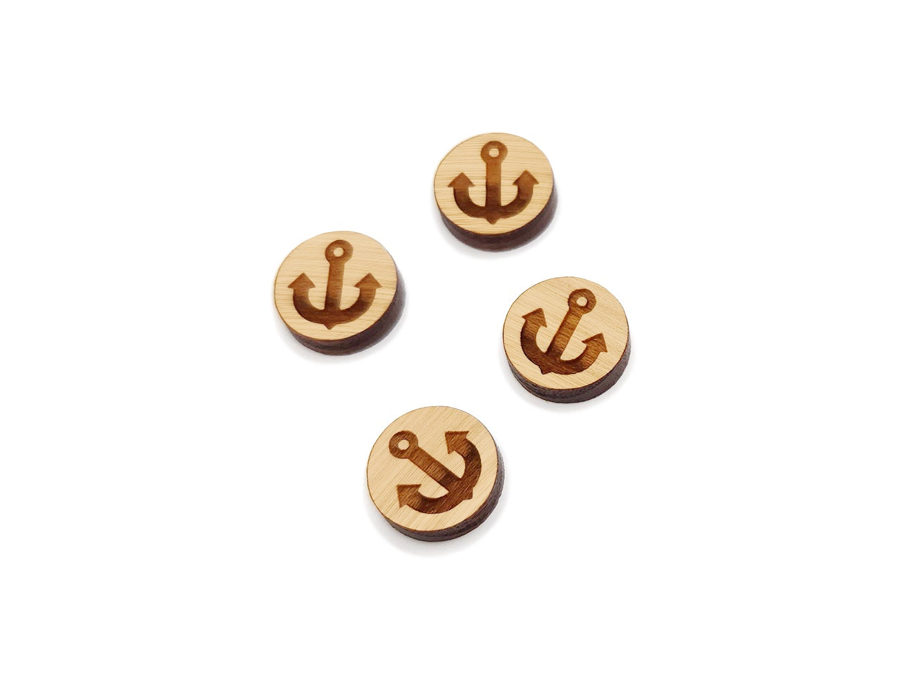 two pairs of round wooden cabochon earring blanks engraved with an anchor silhouette