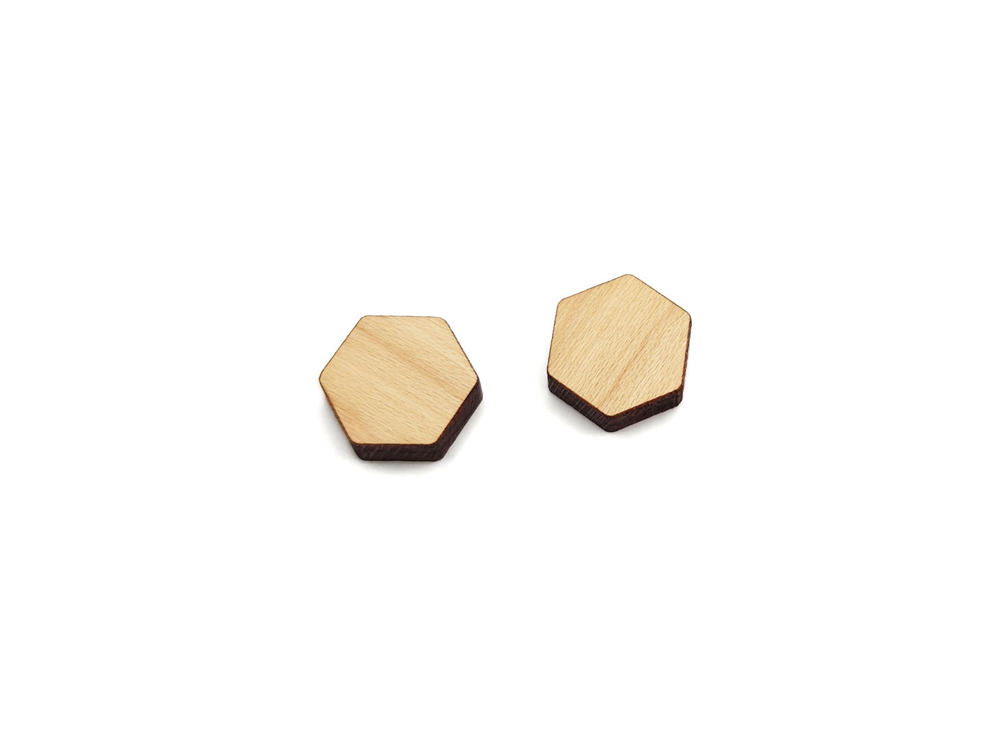 A pair of wood and acrylic cabochon earring blanks cut in the shape of a hexagon