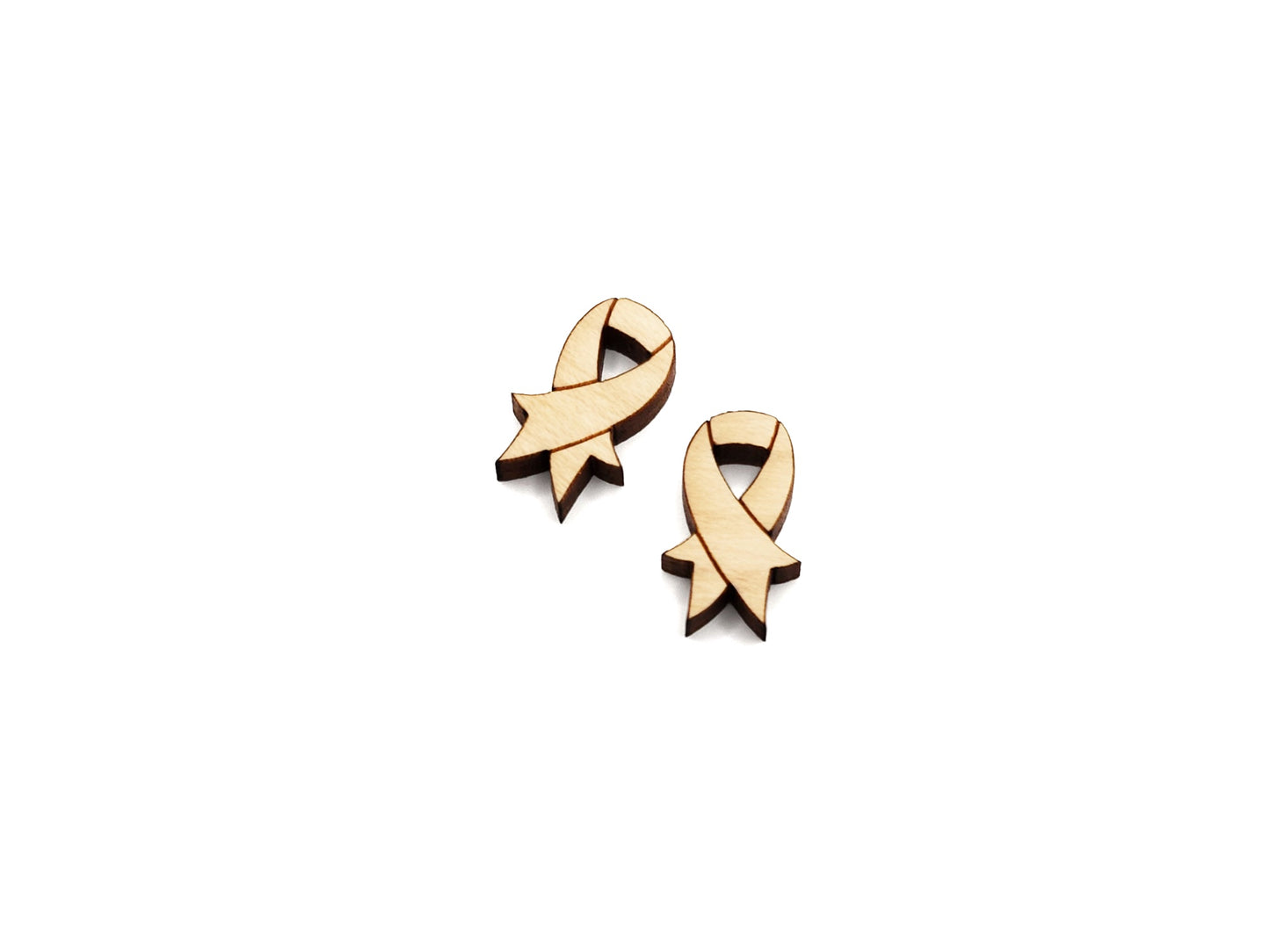 a pair of wooden earrings with a ribbon on them