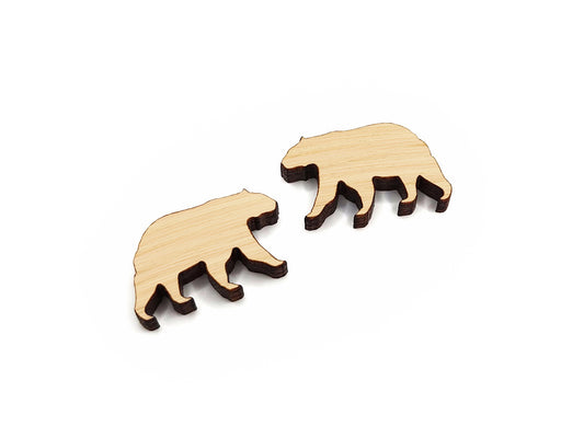 a pair of small acrylic or wood cabochon blanks for stud earrings, cut in the shape of a bear