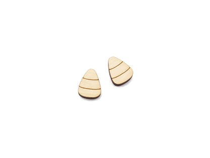 a pair of wooden cabochon stud earring blanks cut and engraved to look like candy corn