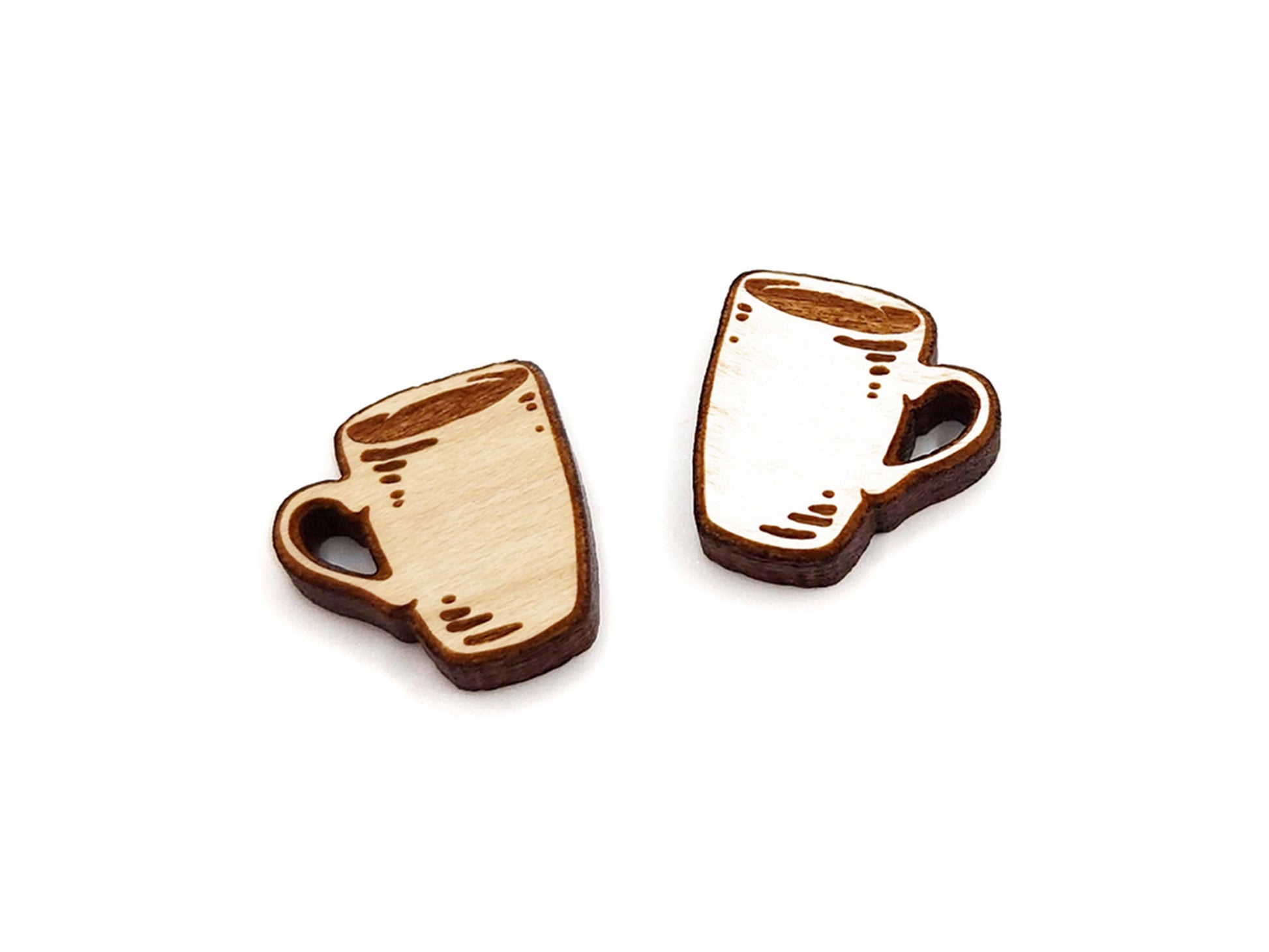 a pair of small wooden cabochon blanks for stud earrings, cut and engraved to look like coffee mugs