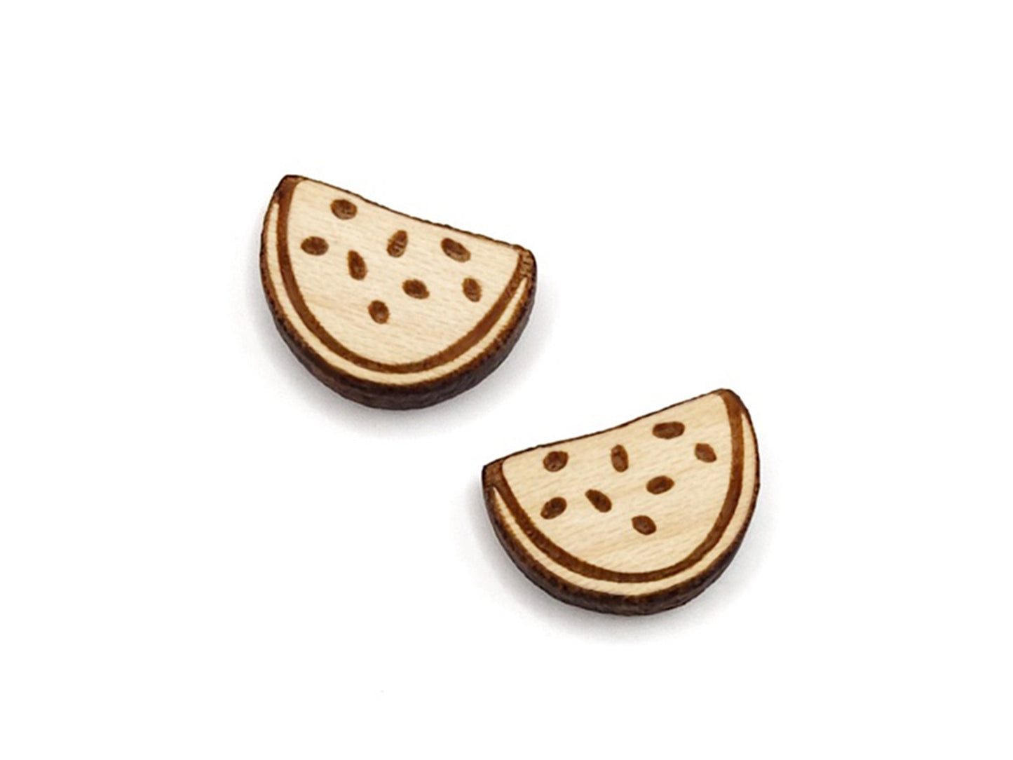 a pair of small wooden cabochon blanks for stud earrings, cut and engraved to look like slices of watermelon