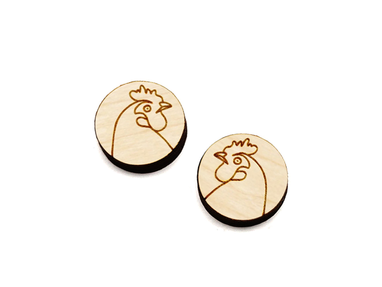 a pair of round wooden cabochon earring blanks engraved with a chicken