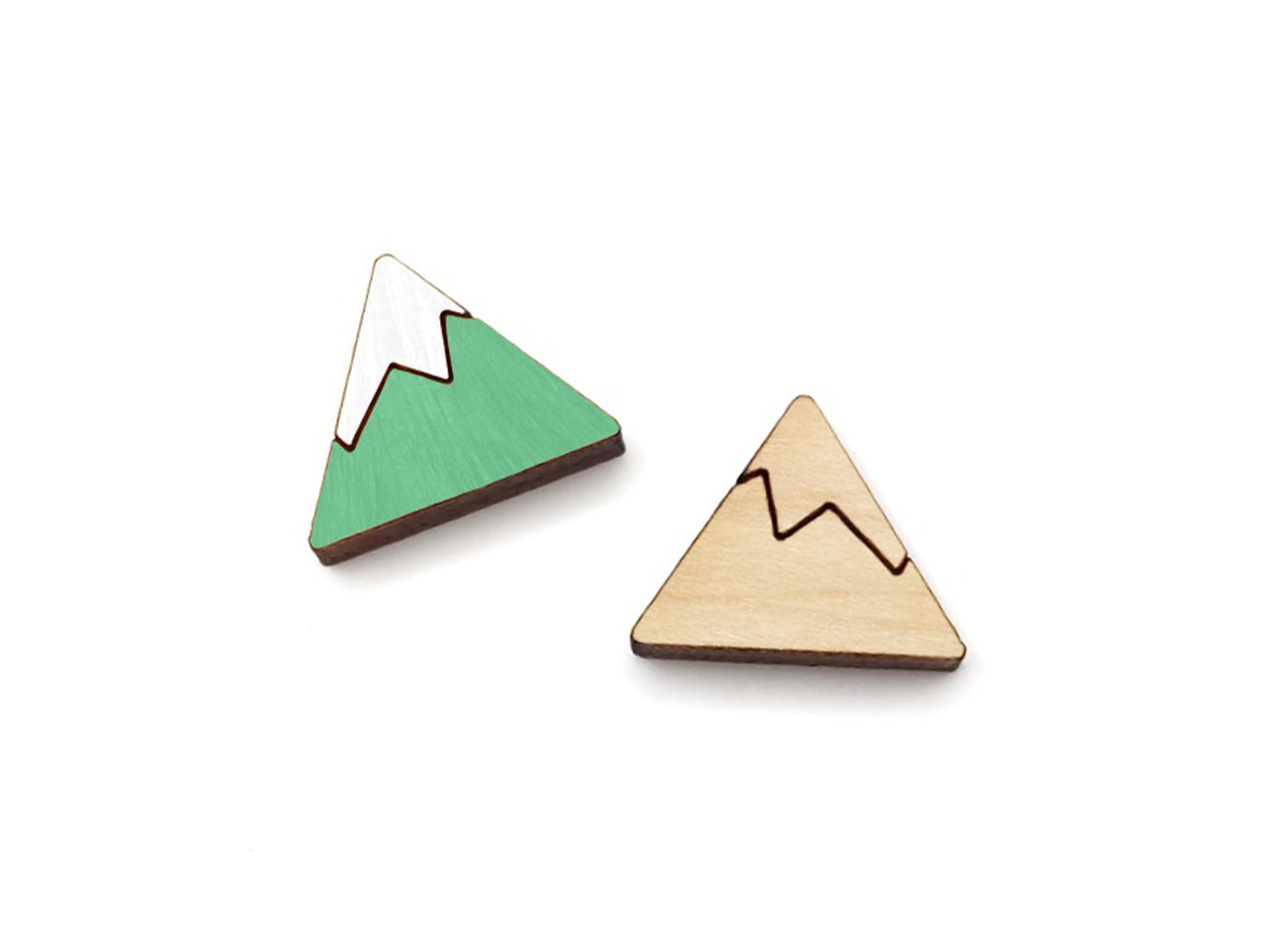 a pair of wooden cabochon stud earring blanks cut and engraved to look like a snow-capped mountain