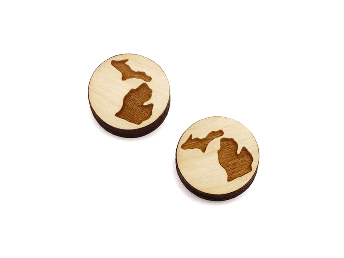 a pair of round wooden cabochon earring blanks engraved with the State of Michigan