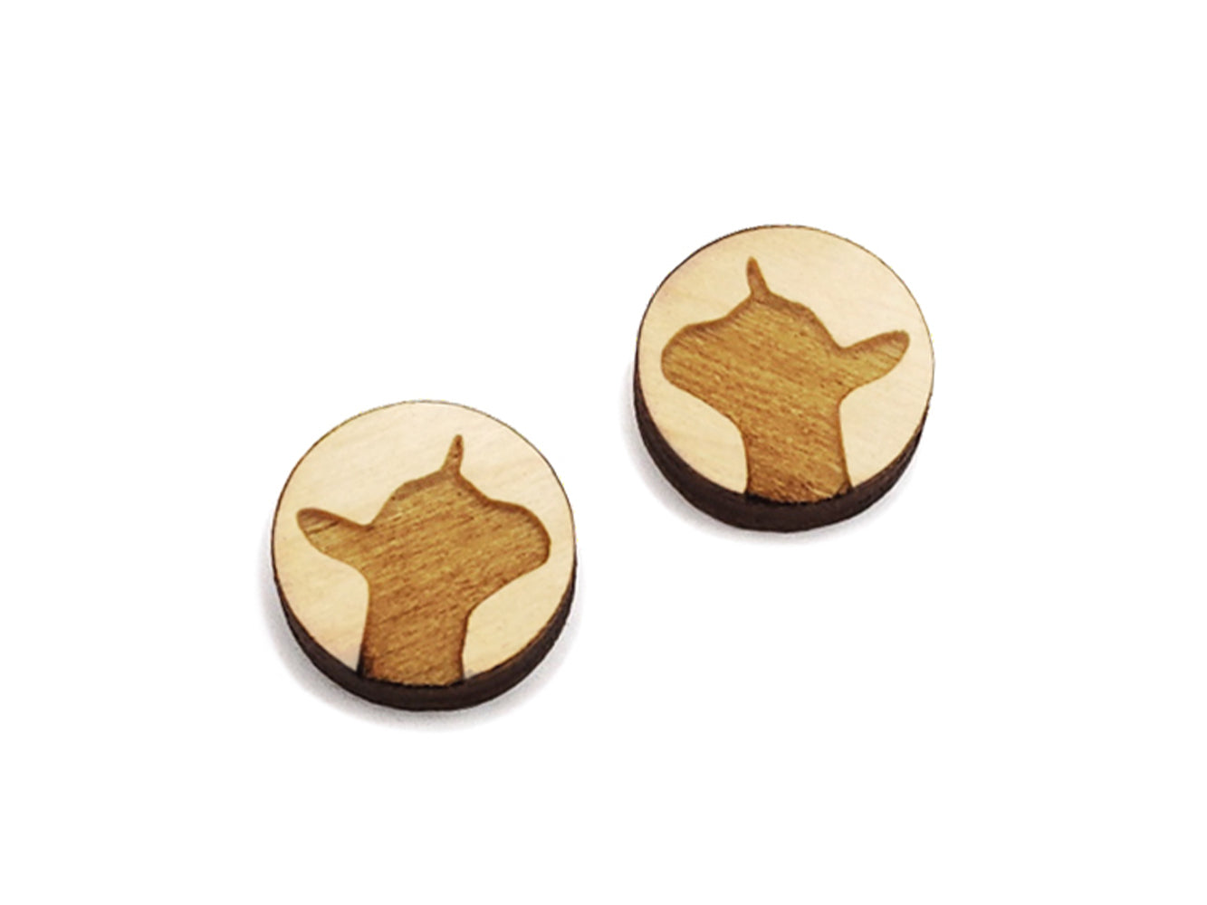 a pair of round wooden cabochon earring blanks engraved with a dairy goat silhouette