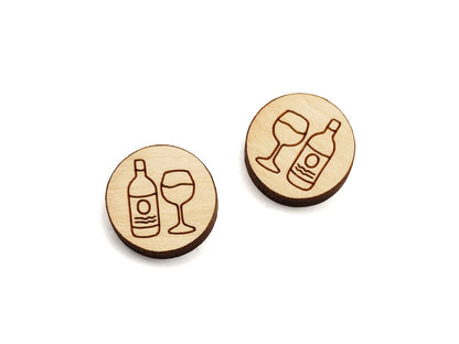 a pair of small round wooden cabochon blanks for stud earrings engraved with a wine bottle and glass