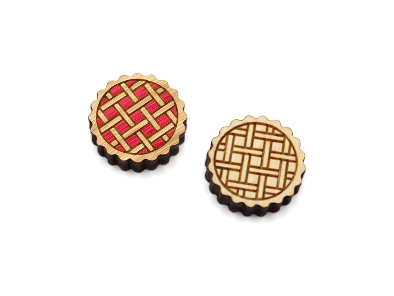 a pair of small wooden cabochon blanks cut and engraved to look like a pie, one is hand painted