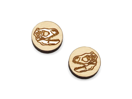 a pair of small round wooden cabochon blanks for stud earrings engraved with a dinosaur skull, one is painted