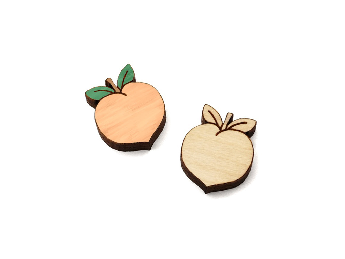 a pair of small wooden cabochon blanks for stud earrings, cut and engraved to look like peaches, one is painted