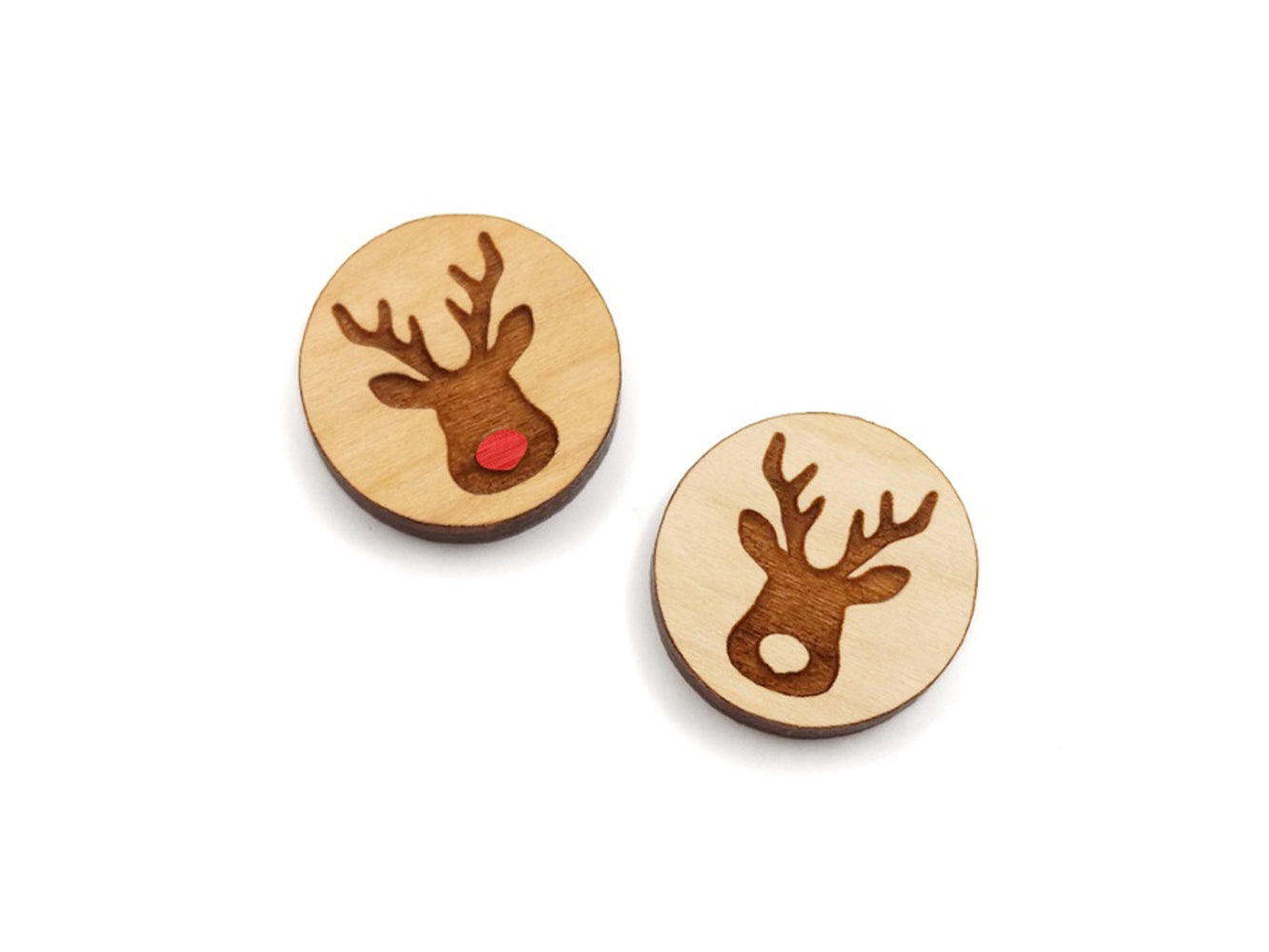 a pair of round wooden cabochon earring blanks engraved with a Christmas Reindeer