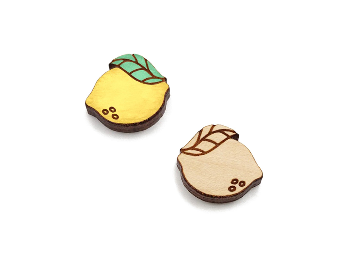 a pair of small wooden cabochon blanks for stud earrings, cut and engraved to look like lemons