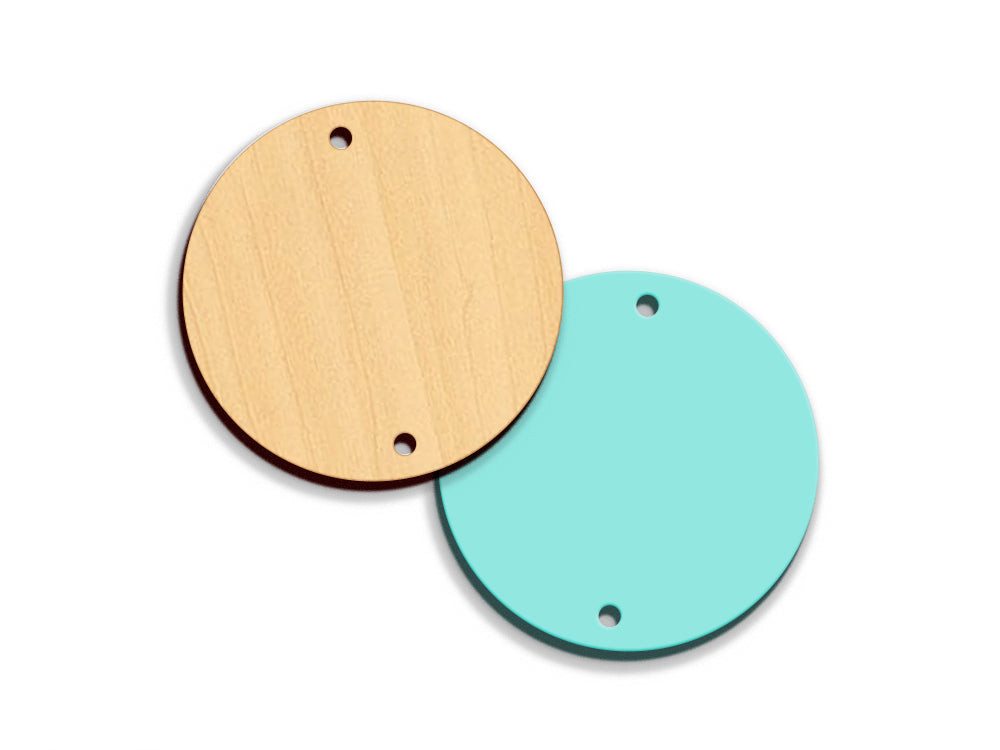 two round wooden tags with holes in the middle