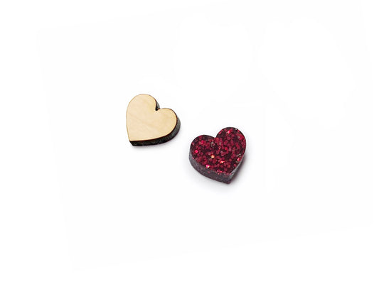 A pair of wood and acrylic cabochon earring blanks cut in the shape of a heart