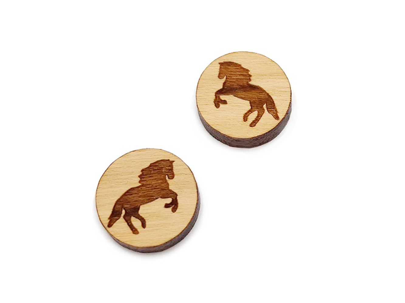 a pair of small round wooden cabochon blank for stud earrings engraved with a rearing horse.