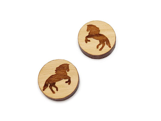 a pair of small round wooden cabochon blank for stud earrings engraved with a rearing horse.