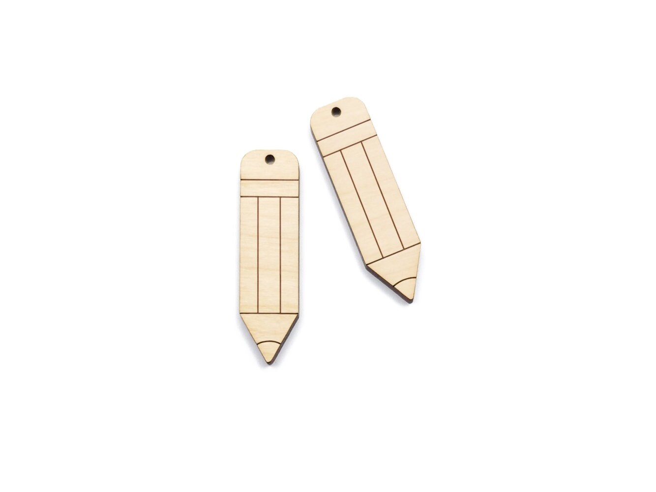 a pair of wooden earring blanks cut and engraved to look like a pencil