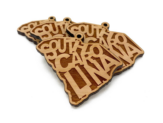 a wooden cutout of the state of south carolina