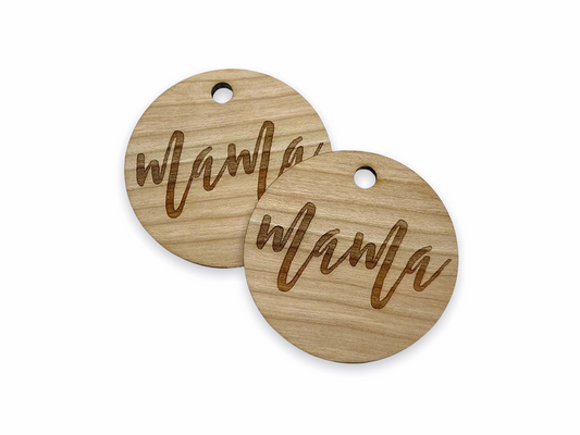 a pair of wooden tags with the words wamn wam on them